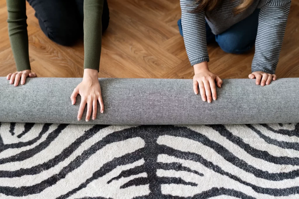 Rolling up a carpet
